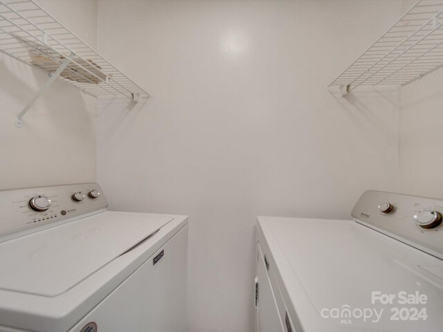 4605 Coronado Dr Unit M, Charlotte, NC 28212 - clothes washing area with laundry area and washing machine and dryer