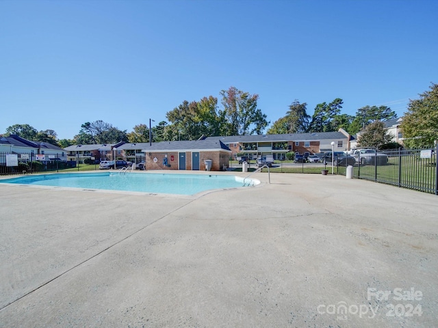 4605 Coronado Dr Unit M, Charlotte, NC 28212 - pool featuring fence, a residential view, and a patio area