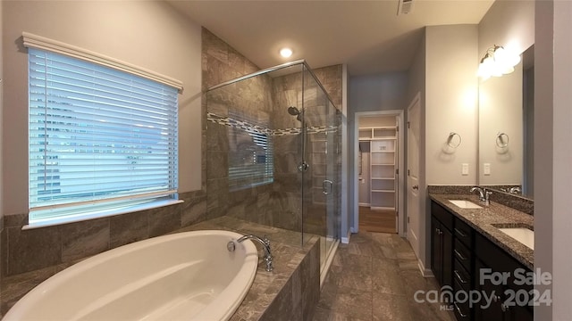 bathroom with vanity, separate shower and tub, and tile patterned flooring