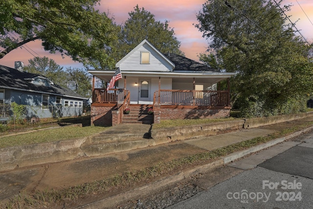 view of front of home featuring covered porch