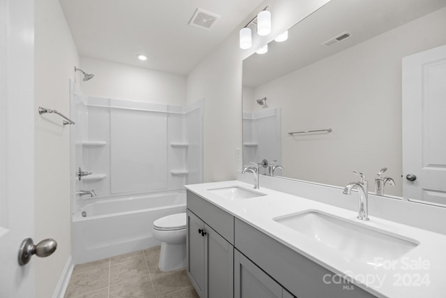 full bathroom with tile patterned flooring, shower / bath combination, toilet, and vanity