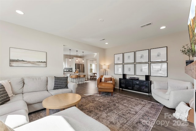 living room with wood-type flooring