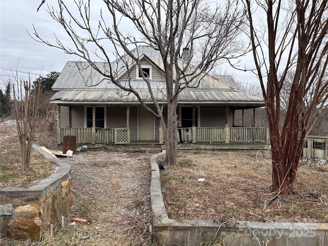 country-style home with covered porch