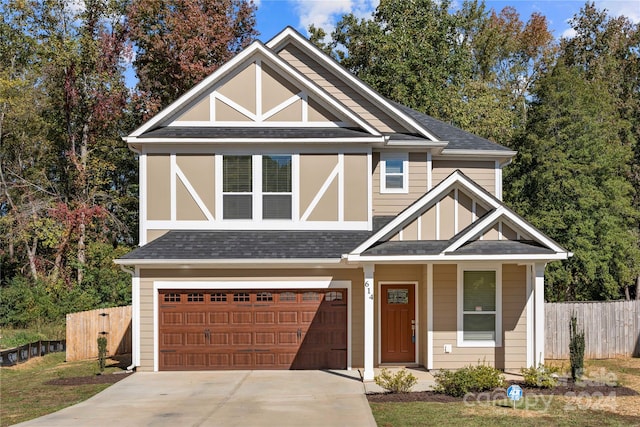 view of front of home with a garage