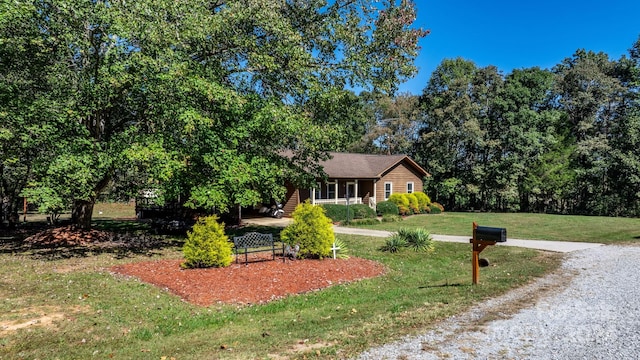 view of front facade with a porch and a front yard