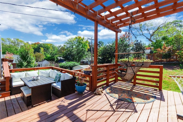 wooden terrace featuring an outdoor hangout area and a pergola