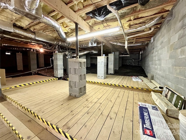 basement featuring heating unit