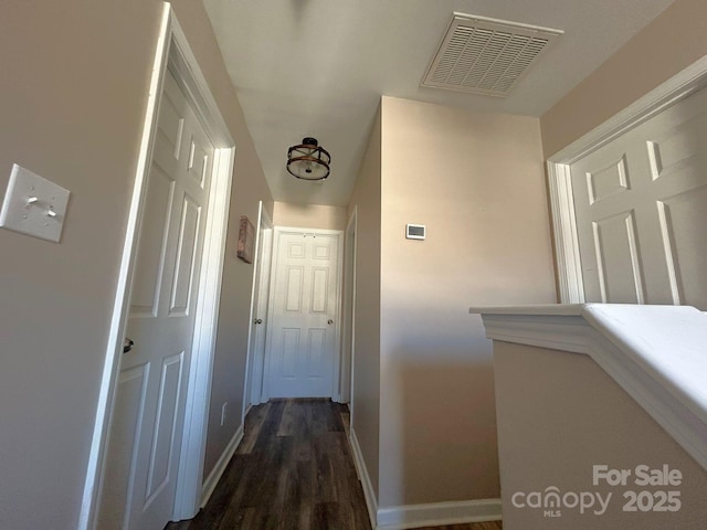 hall featuring dark hardwood / wood-style flooring