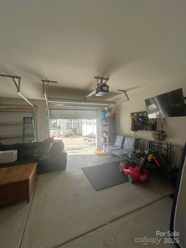 garage featuring a garage door opener