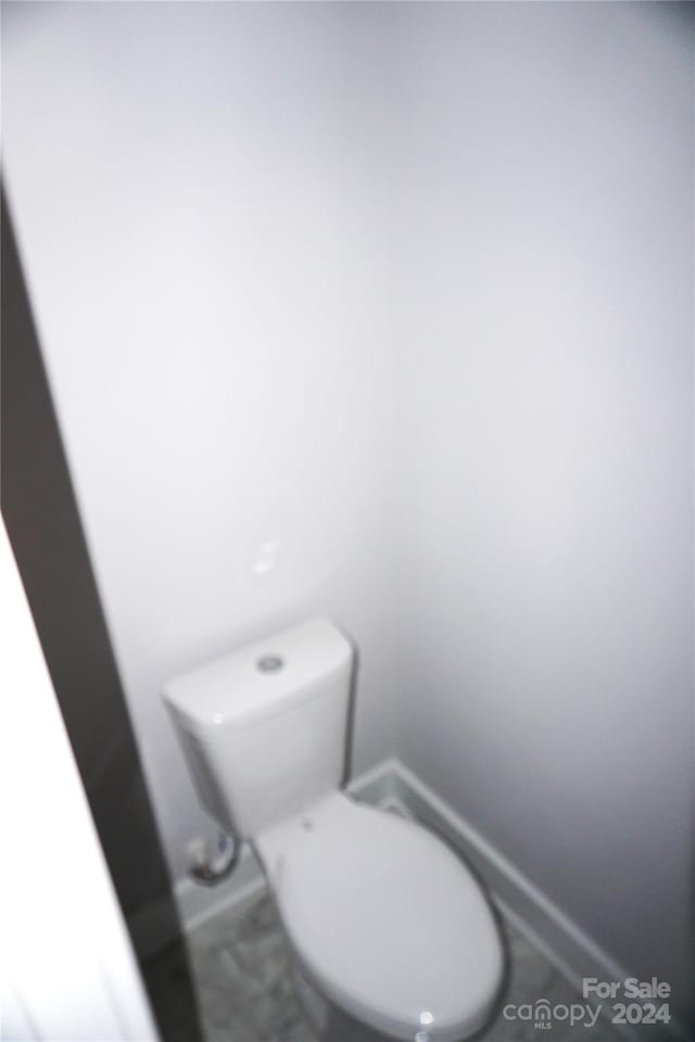 bathroom featuring toilet