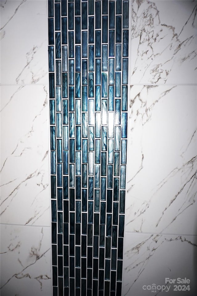 details with a tile shower