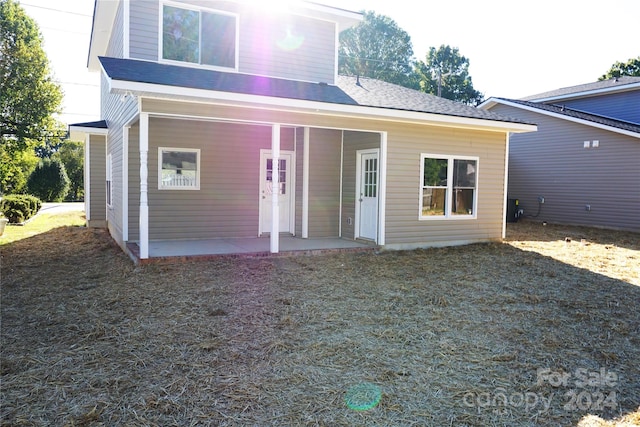 rear view of property with a patio area