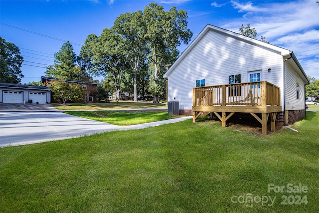 exterior space with a wooden deck, an outdoor structure, and central air condition unit