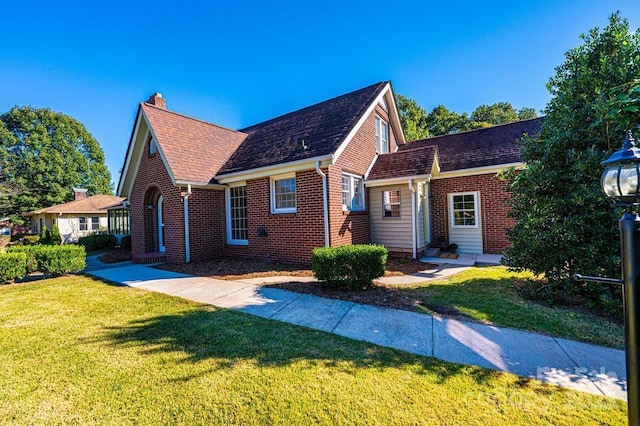 view of front of house with a front yard