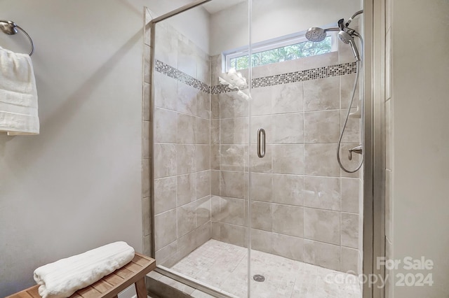 bathroom featuring walk in shower