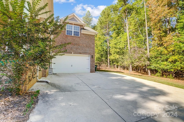 view of home's exterior featuring a garage