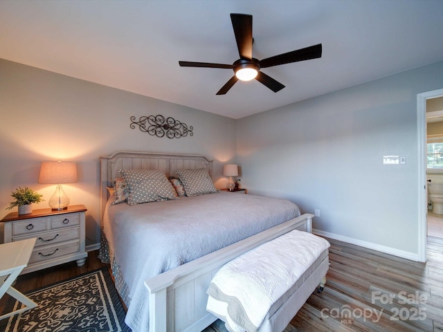 bedroom featuring dark wood-type flooring, baseboards, and a ceiling fan