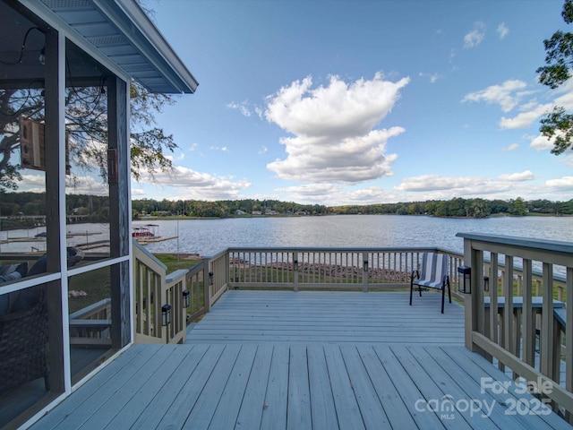 deck featuring a water view