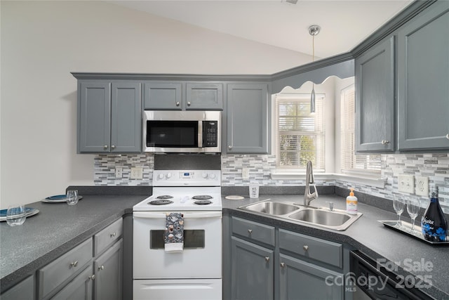 kitchen featuring electric stove, sink, and gray cabinetry