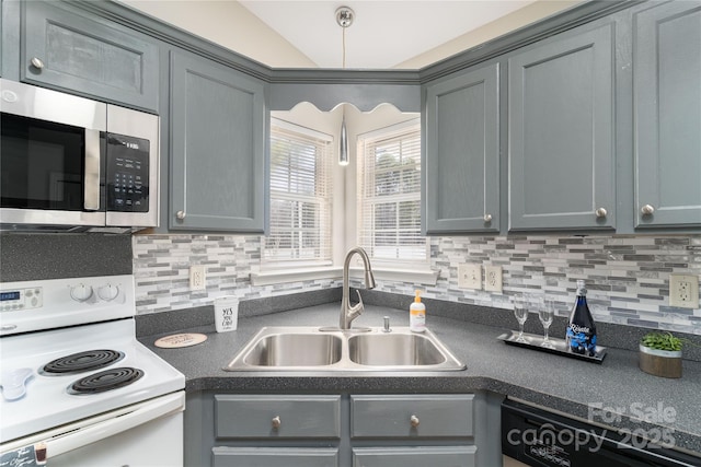 kitchen with gray cabinets, sink, and white range with electric cooktop