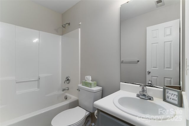 full bathroom featuring vanity, toilet, and washtub / shower combination