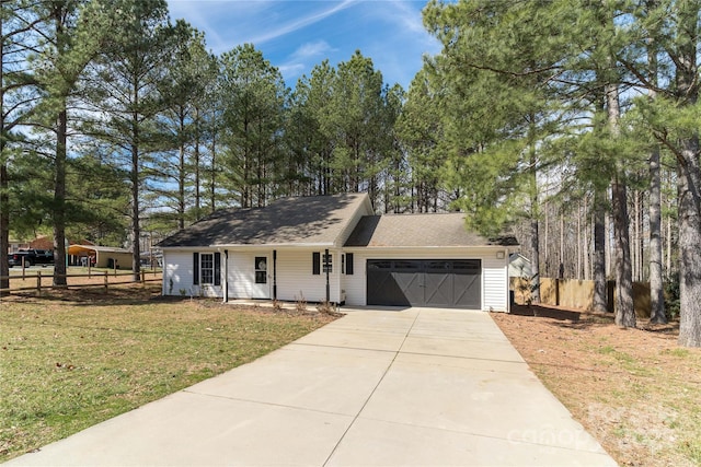 single story home featuring a front yard and a garage