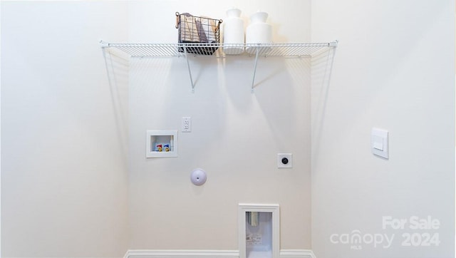 laundry area with hookup for a washing machine, hookup for a gas dryer, and hookup for an electric dryer