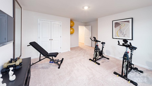 workout area with light colored carpet