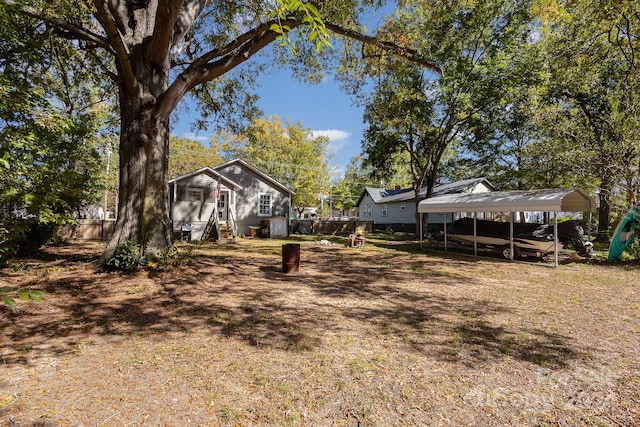 view of yard with a carport