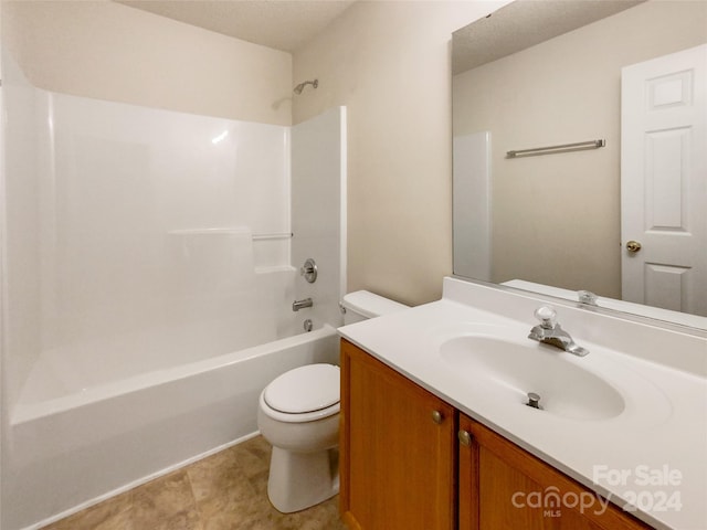 full bathroom featuring vanity, toilet, and shower / bath combination