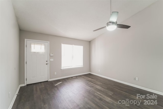 entrance foyer featuring dark hardwood / wood-style floors and ceiling fan