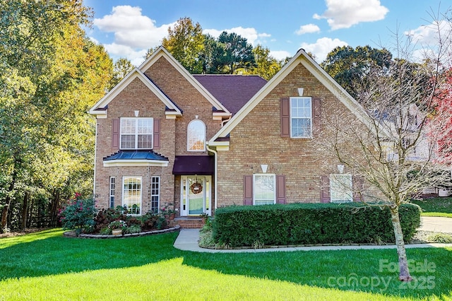 view of front property with a front lawn