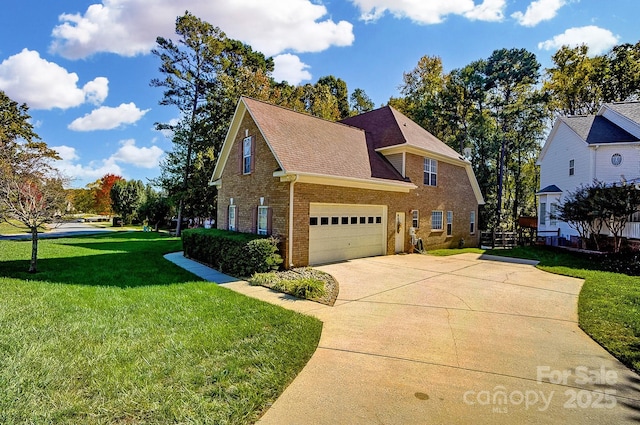 view of front facade featuring a garage and a front yard