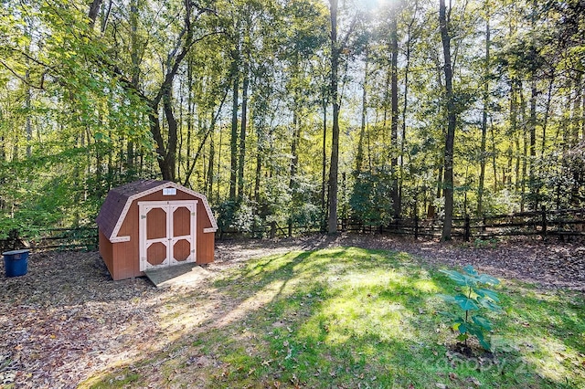 view of outbuilding with a lawn