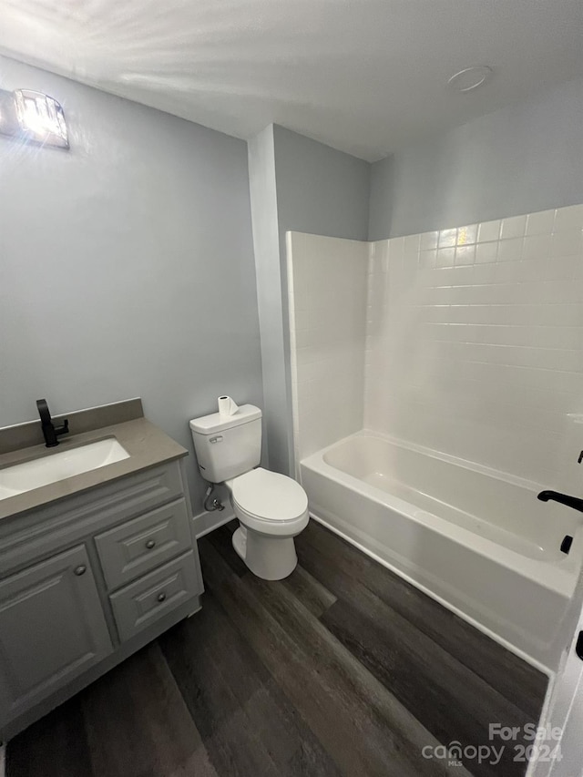 560 2nd St, Chester, SC 29706 - full bathroom featuring wood finished floors, toilet, and vanity