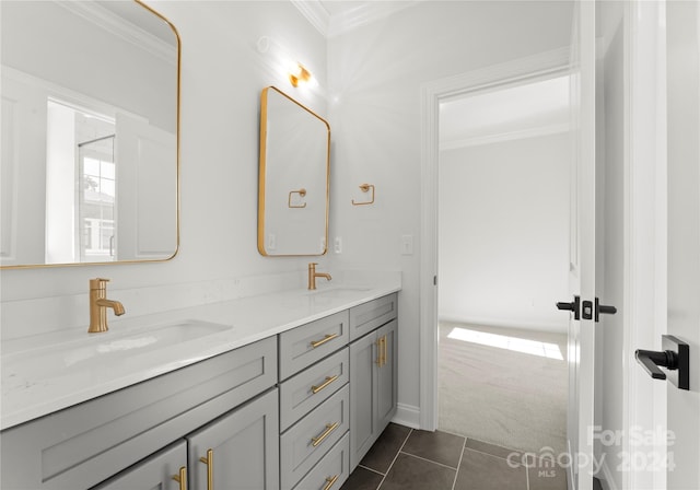 bathroom with vanity, crown molding, and tile patterned floors