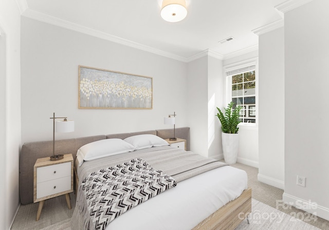 carpeted bedroom with crown molding