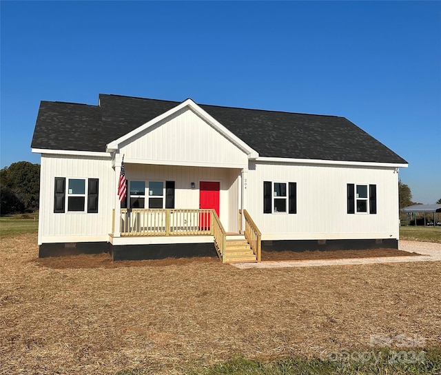 view of front of property featuring covered porch