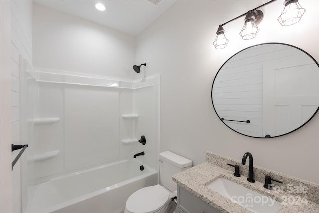 full bathroom featuring vanity,  shower combination, and toilet