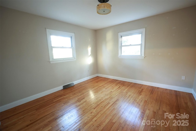 empty room featuring light wood-type flooring