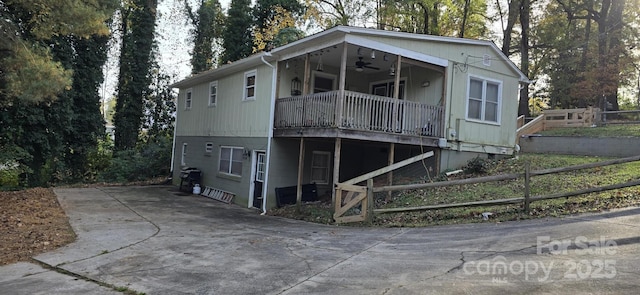 back of house featuring ceiling fan