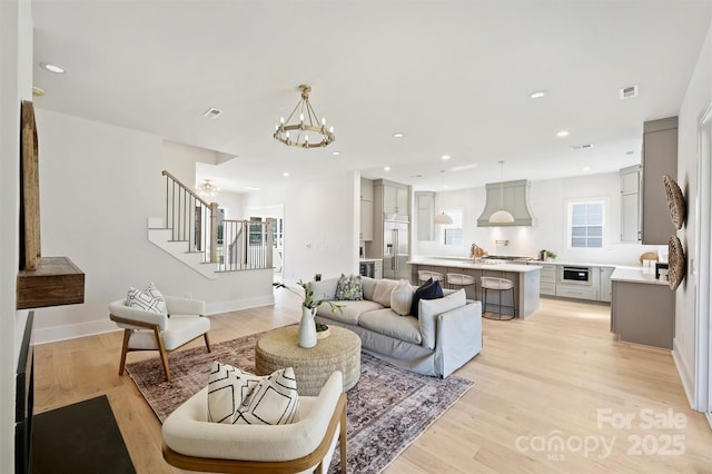571 Lyttleton Dr, Charlotte, NC 28211 - living area with stairs, visible vents, light wood-style flooring, and recessed lighting