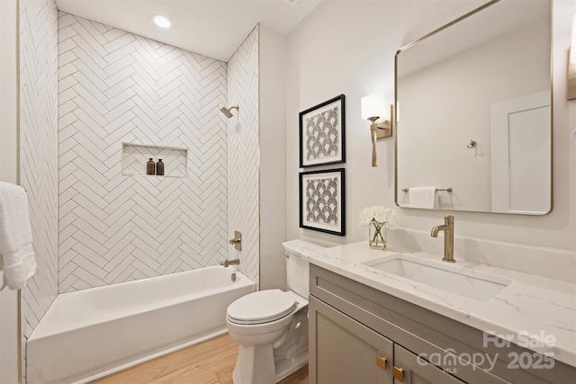 571 Lyttleton Dr, Charlotte, NC 28211 - full bathroom with bathtub / shower combination, toilet, recessed lighting, vanity, and wood finished floors