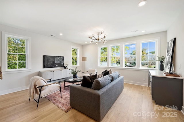 571 Lyttleton Dr, Charlotte, NC 28211 - living area with recessed lighting, light wood-type flooring, baseboards, visible vents, and a notable chandelier