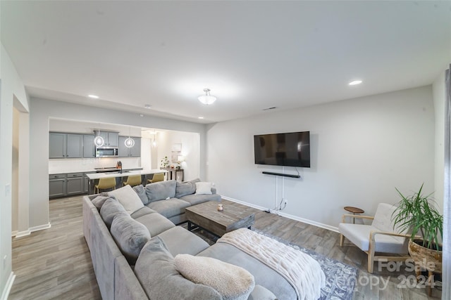 living room featuring light wood-type flooring