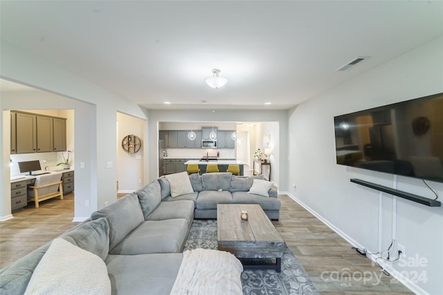 living room with light wood-type flooring