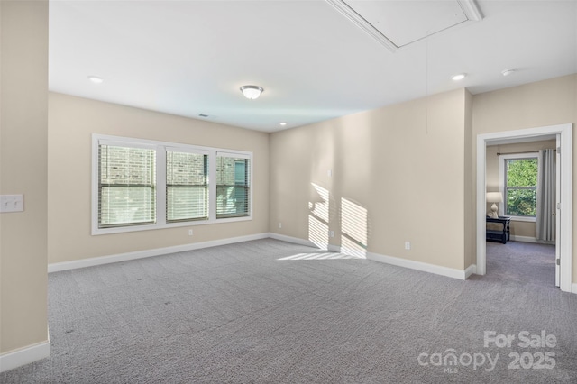 view of carpeted spare room