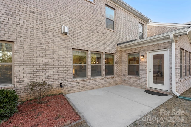 back of house featuring a patio area