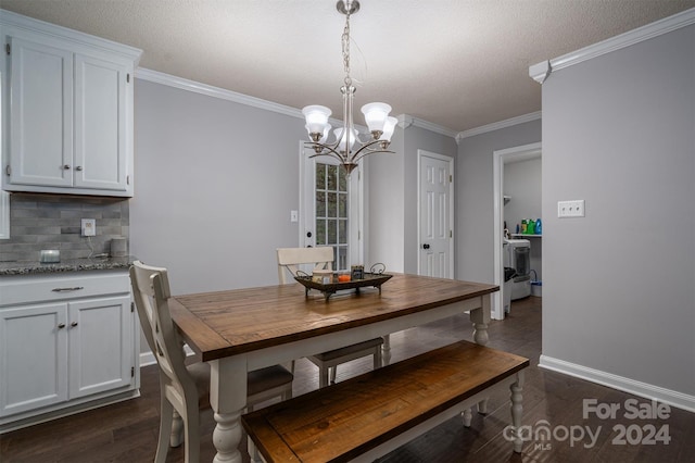 dining area featuring dark hardwood / wood-style floors, a textured ceiling, a chandelier, and crown molding