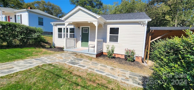 view of front of home with a front yard